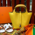 HM PICOTIN LOCK 18 LEMON EPSOM WITH BRAID STRAP