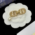 CD Brooch 178847