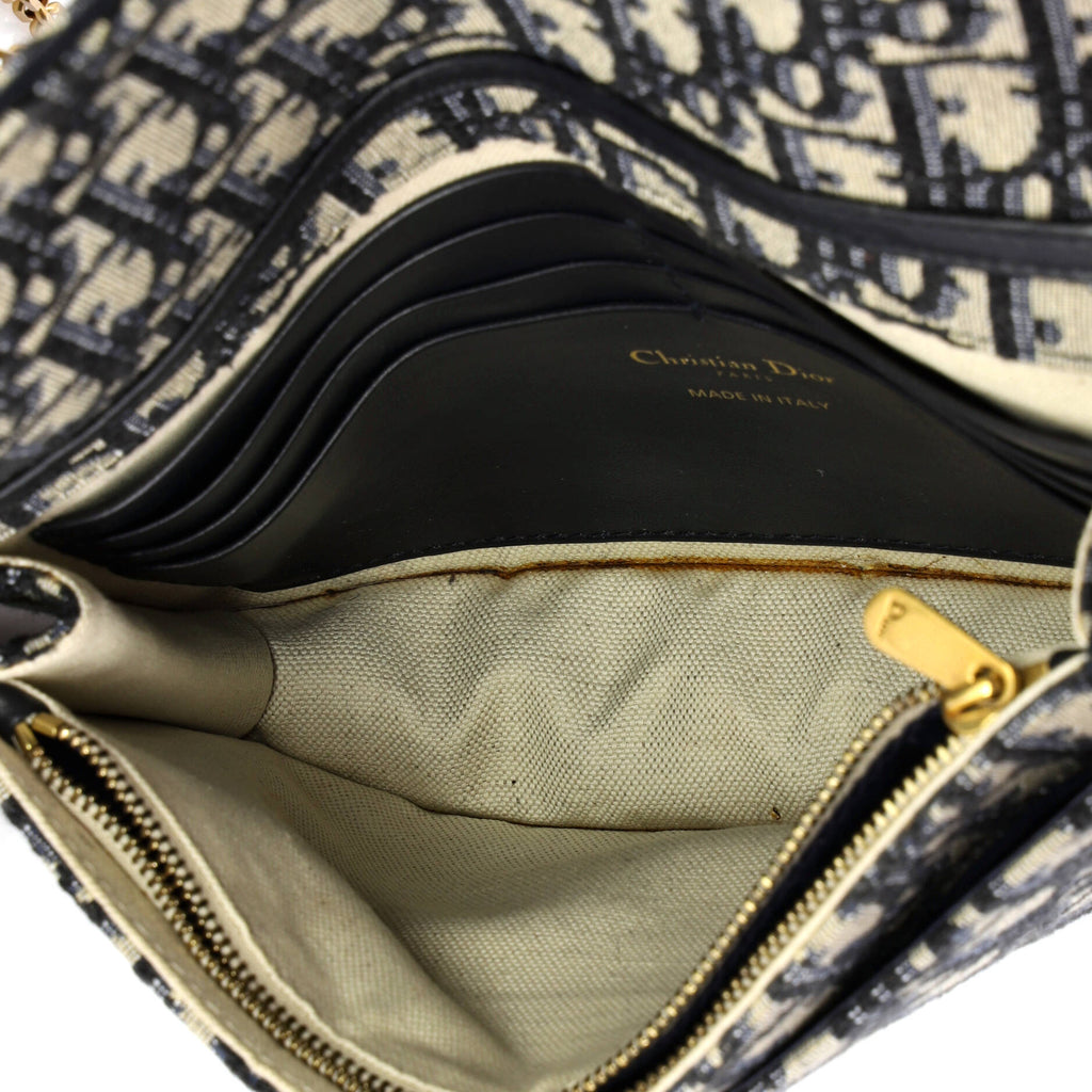 Saddle Chain Clutch Oblique Canvas