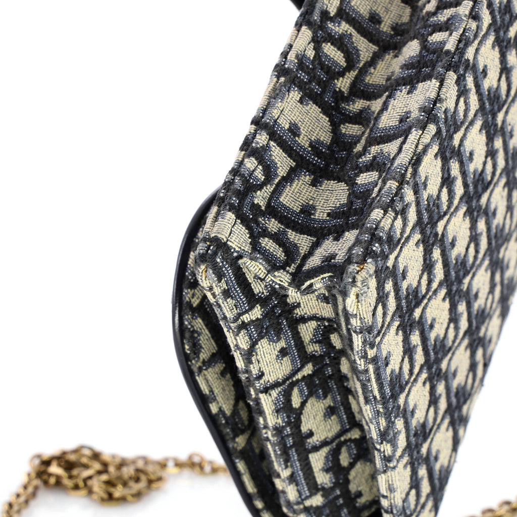 Saddle Chain Clutch Oblique Canvas