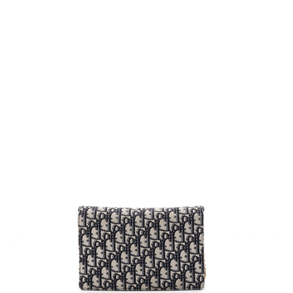 Saddle Chain Clutch Oblique Canvas