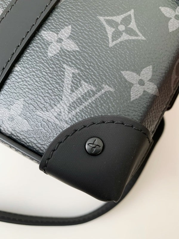L X V's new Sac Plat Horizontal Zippé men's black flower briefcase M45165 Size:  22.5*14*5cm