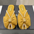 Chanel 2026  Pearl Bow Flat Slipper Suede Sheepskin 713038