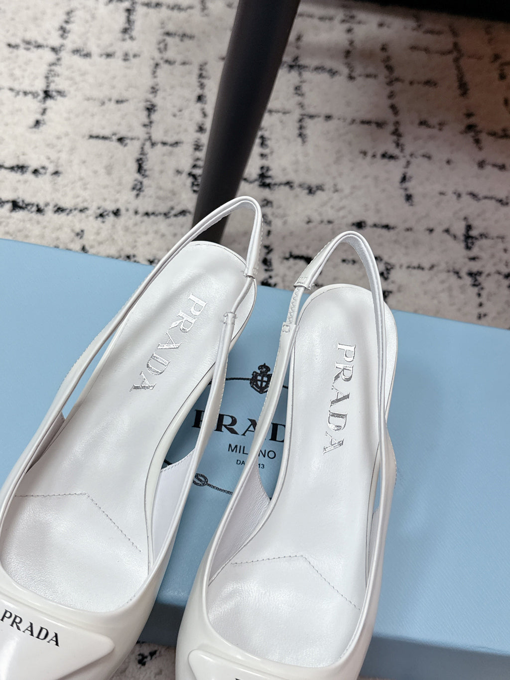 PRADA 26S SLINGBACK PUMPS 60MM IN WHITE PATENT CALFSKIN
