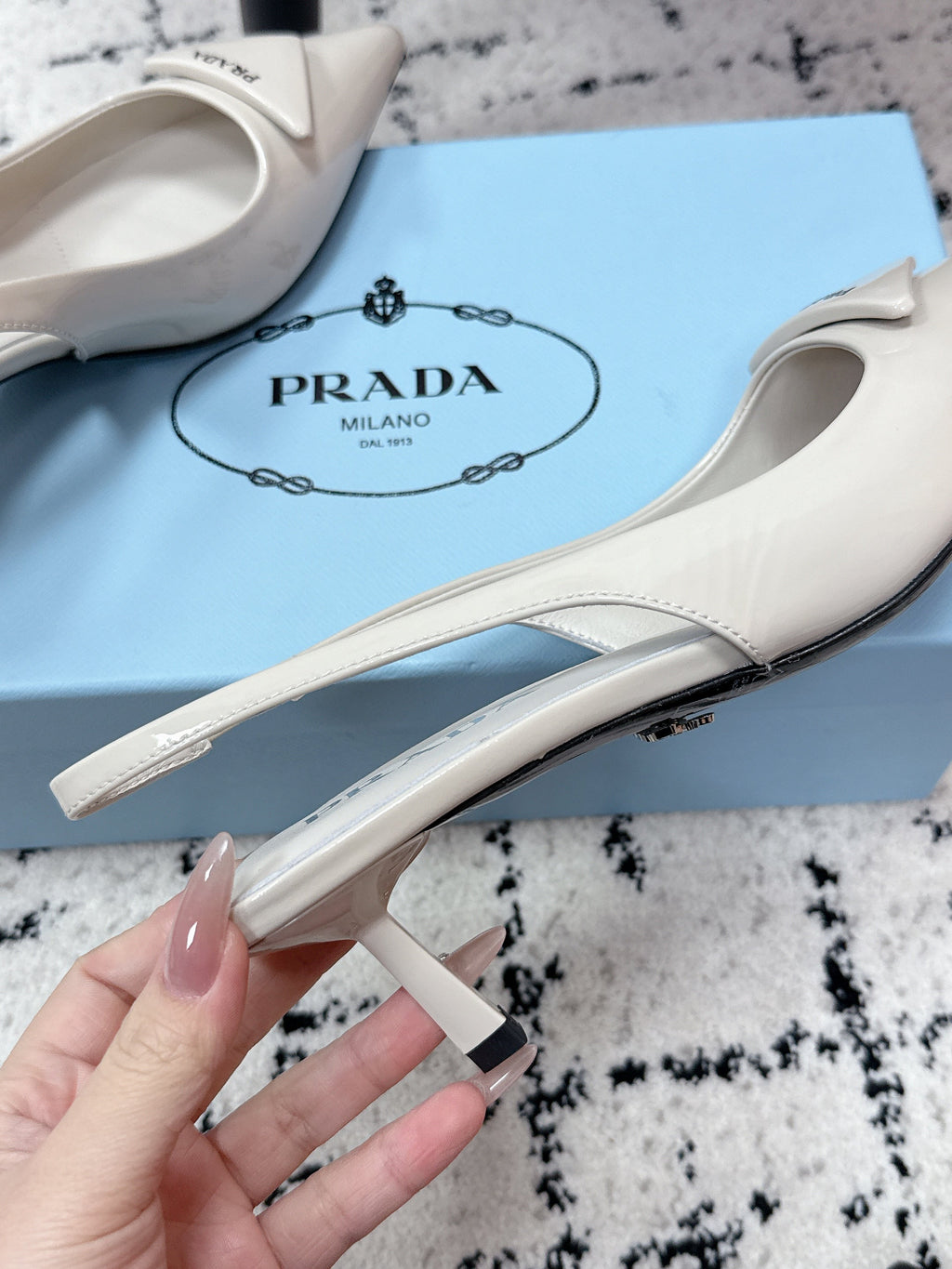 PRADA 26S SLINGBACK PUMPS 60MM IN CREAM WHITE PATENT CALFSKIN