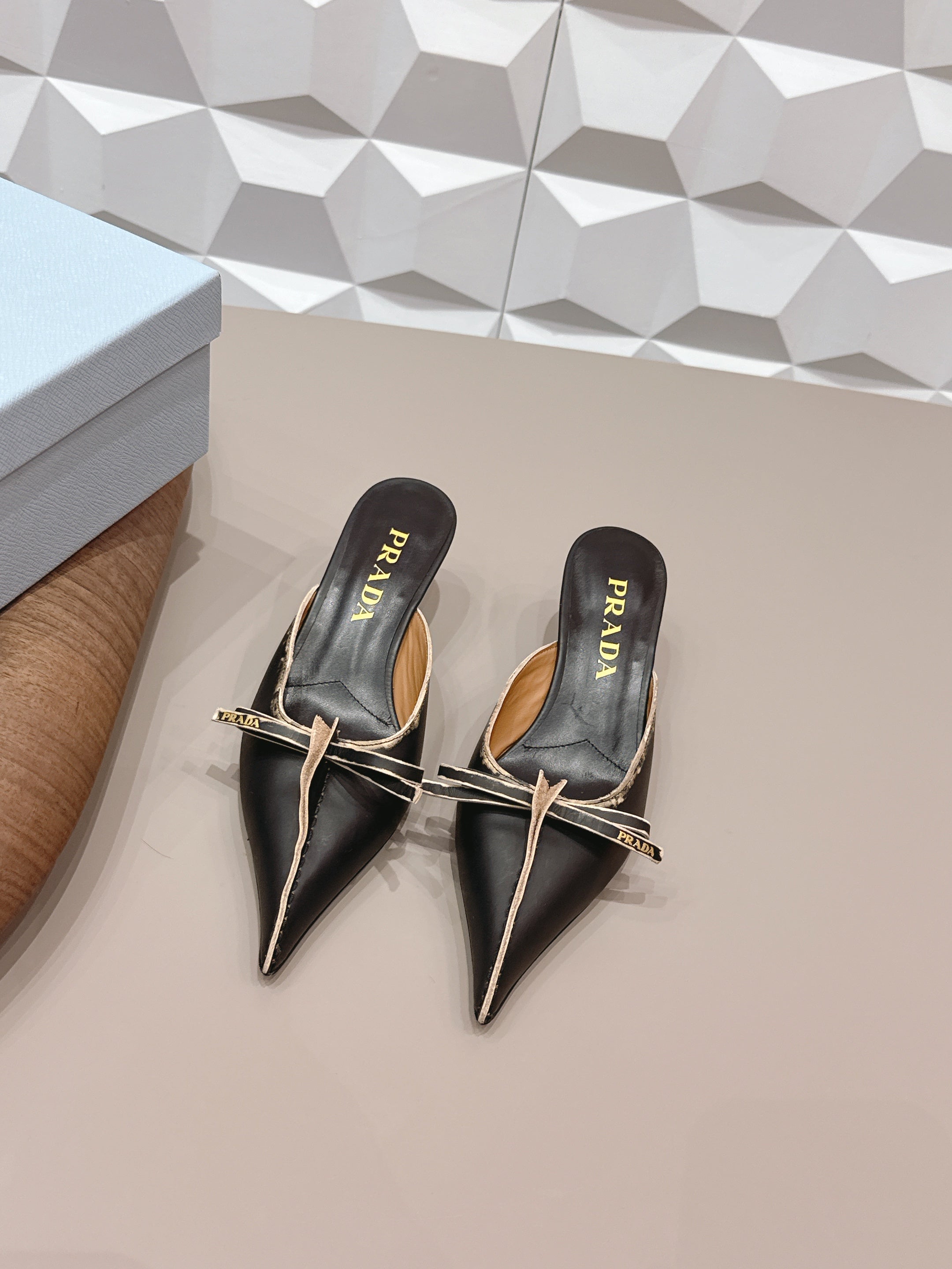 PRADA 26S POINTED TOE LACE TRIM MULES 55MM IN BLACK CALFSKIN WITH BOW