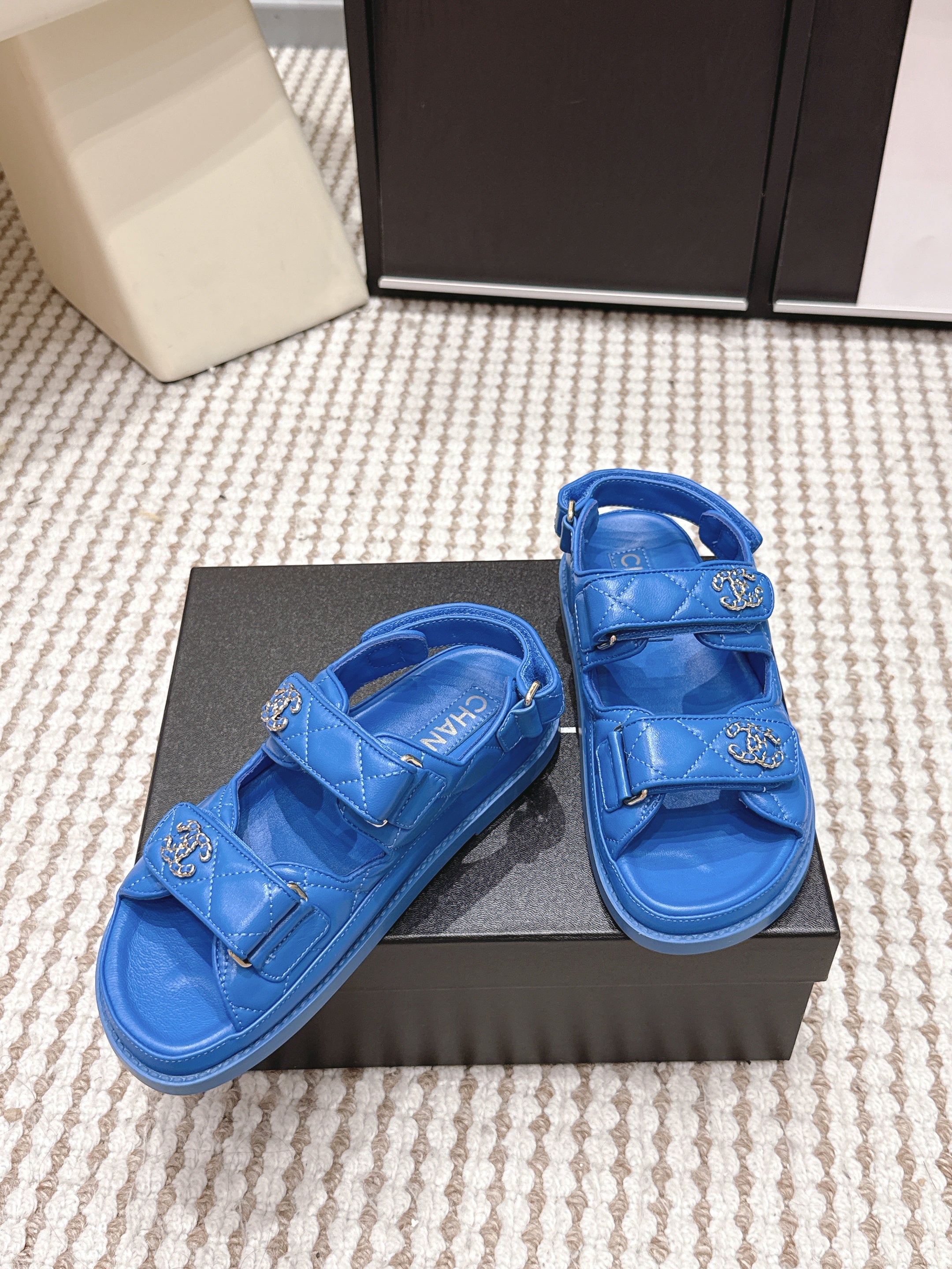 CHANEL 26S QUILTED DAD SANDALS IN BLUE CALFSKIN