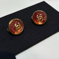 Chanel Gripoix Earrings With Gold CC Logo And Red Glass Stones