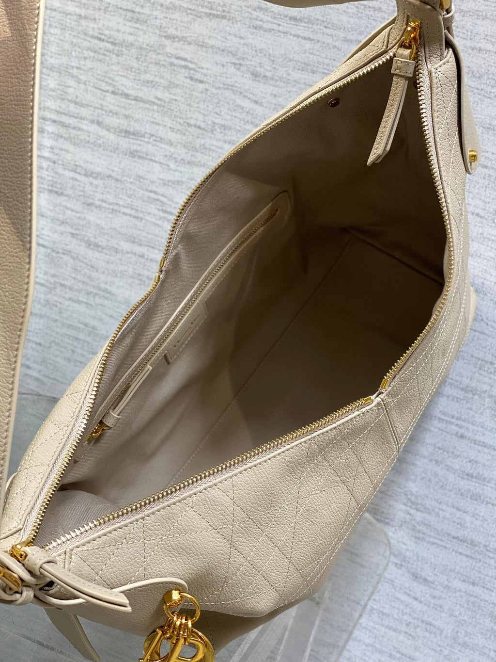 Dior 2025 Voyage Bag 34cm Powder Beige Grained Calfskin 267779