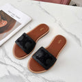 LYMPIA MULE BLACK RAFFIA AND WOOL