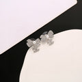 CC Double C Bow Sliver Diamond Pearl Earrings