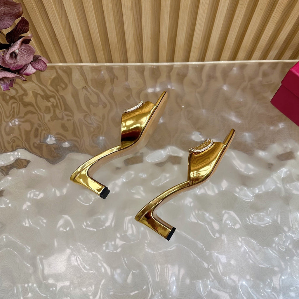 VALENTINO 25S HIGH-HEEL MULES 60 MM IN GOLD PATENT CALFSKIN WITH CRYSTAL-EMBELLISHED STRAP