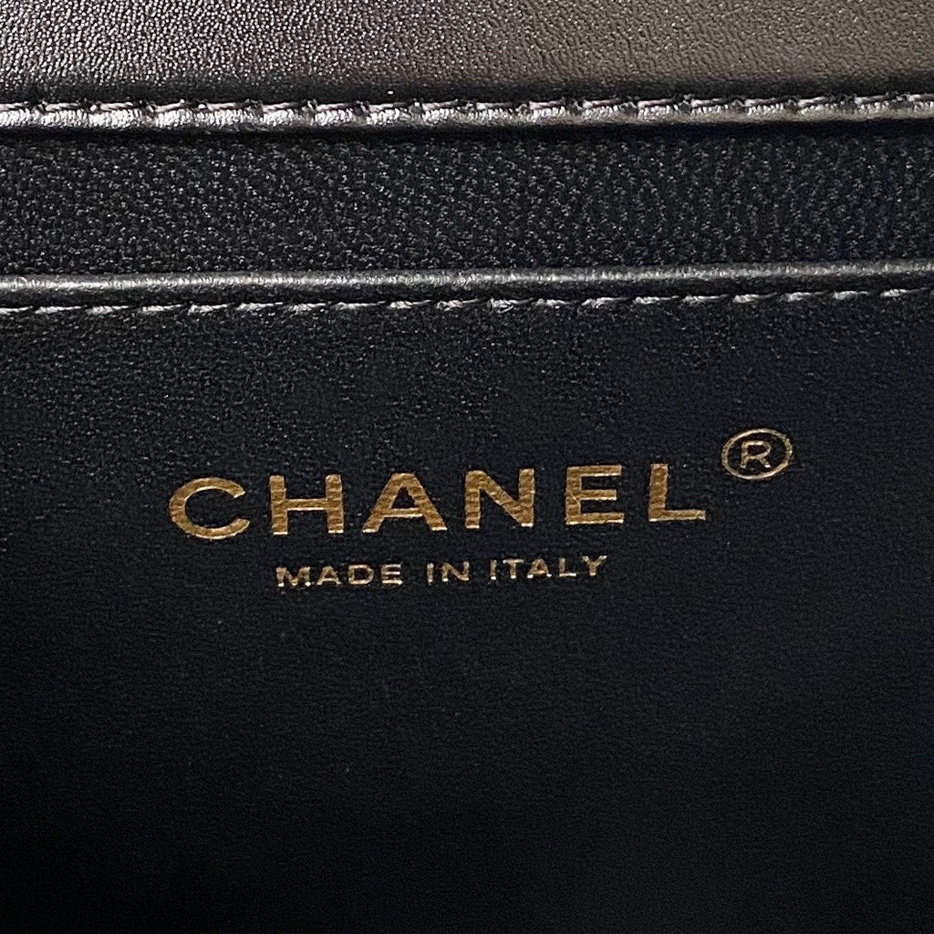 FLAP BAG 22 IN BLACK CALFSKIN WITH DOUBLE GOLD BALL