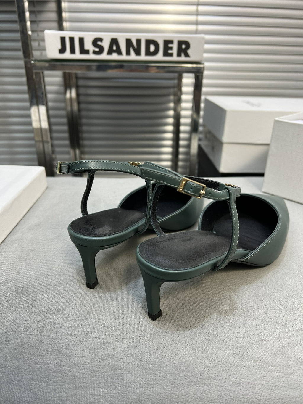 cl kitten 50 blue green calfskin