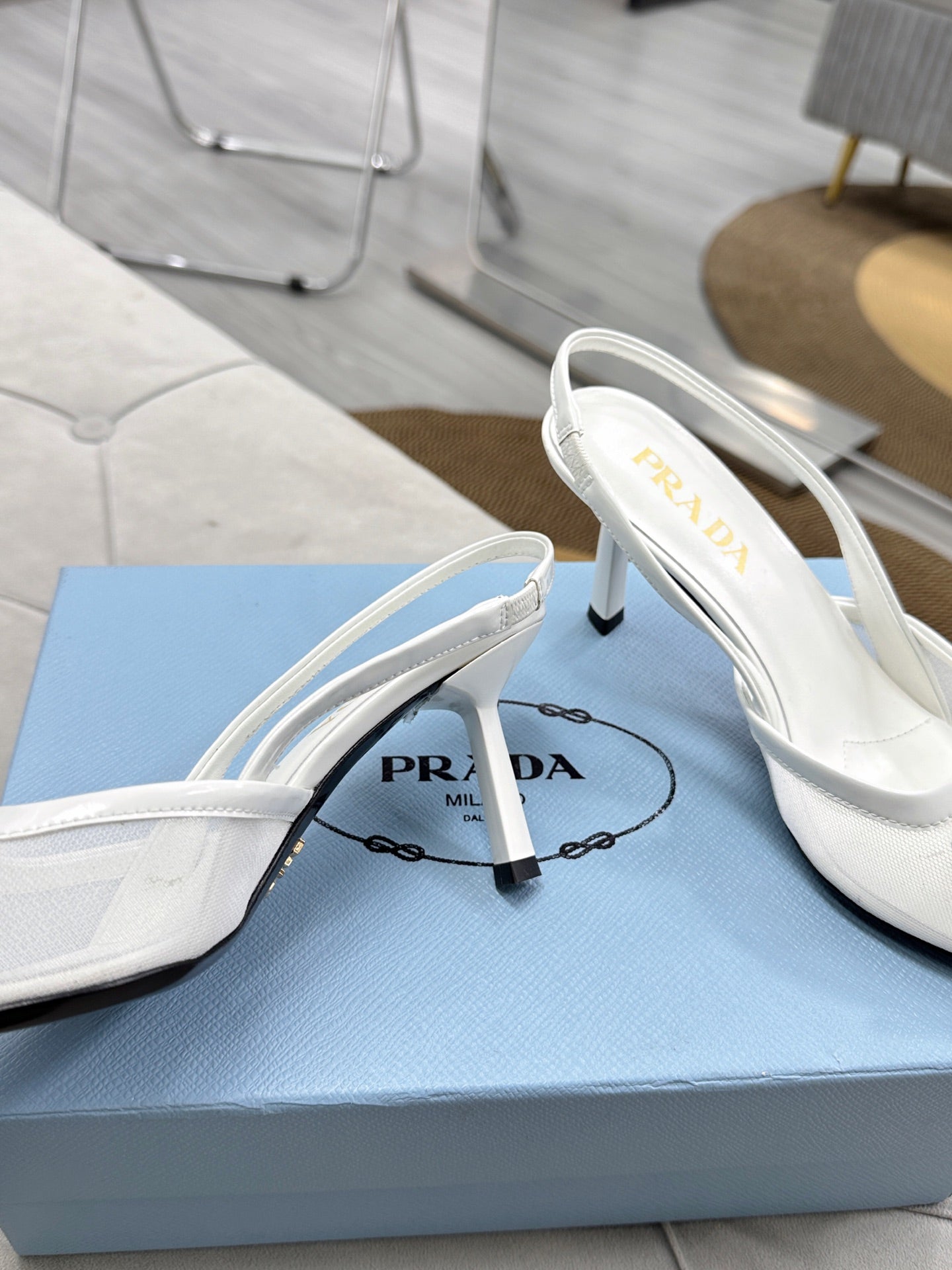 PRADA 25S TRIANGLE LOGO SLINGBACK PUMPS IN WHITE MESH FABRIC