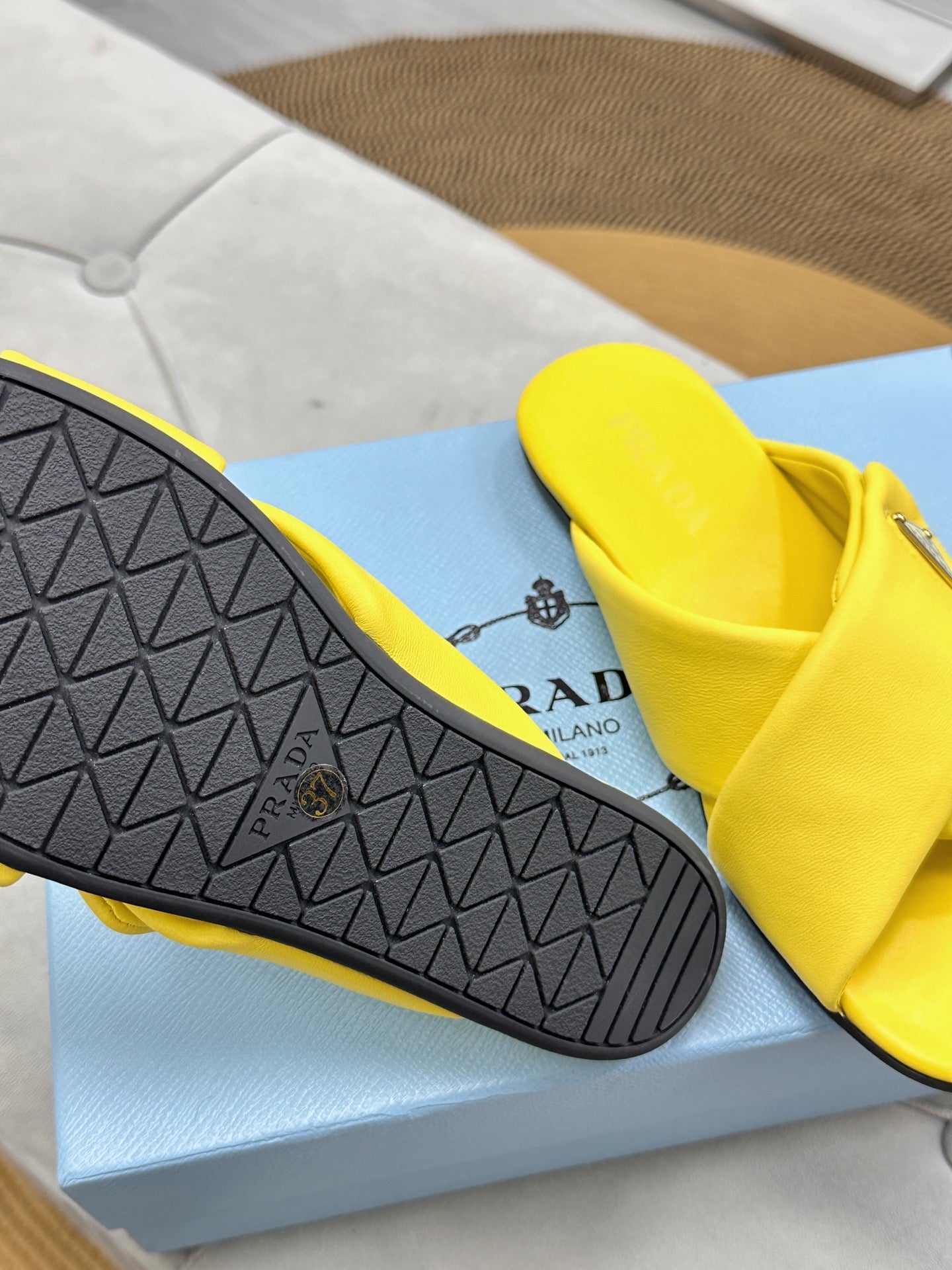 PRADA 25S SLIDE SANDALS IN YELLOW CALFSKIN LOGO