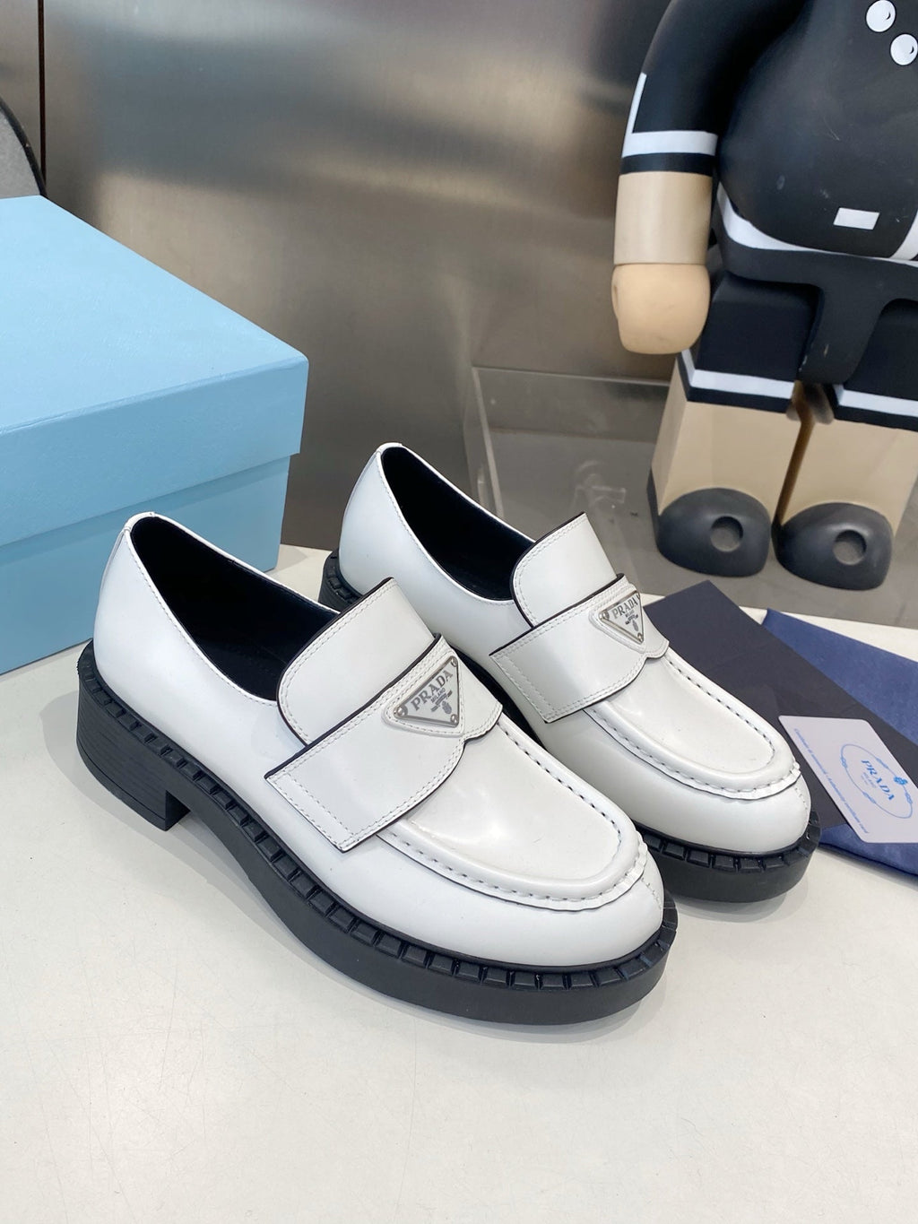 PRADA 26S LOAFERS IN WHITE CALFSKIN WITH LOGO
