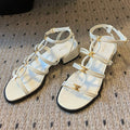 CLEMENCE MULTI TRIOMPHE 45 MM SANDAL IN WHITE LAMBSKIN