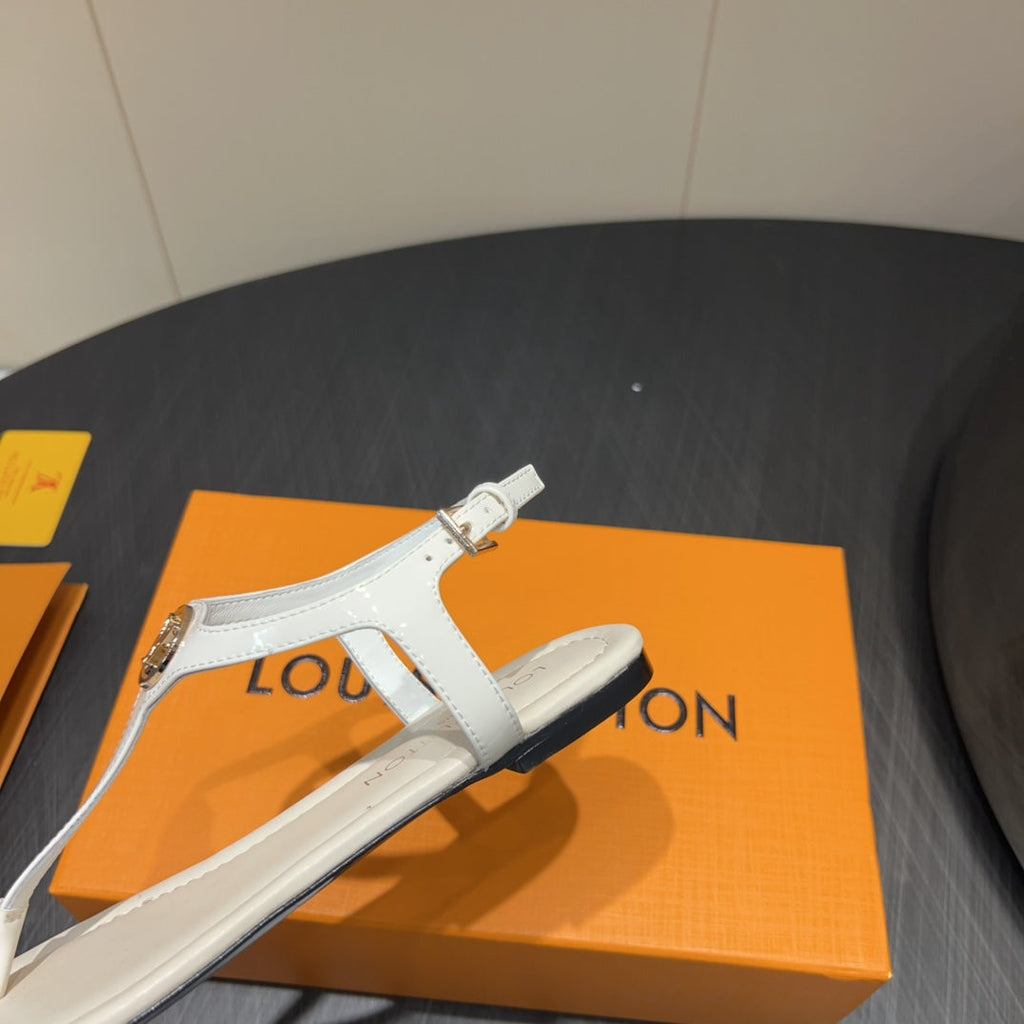 LV THONG SANDALS 25S IN WHITE CALFSKIN WITH GOLD HARDWARE