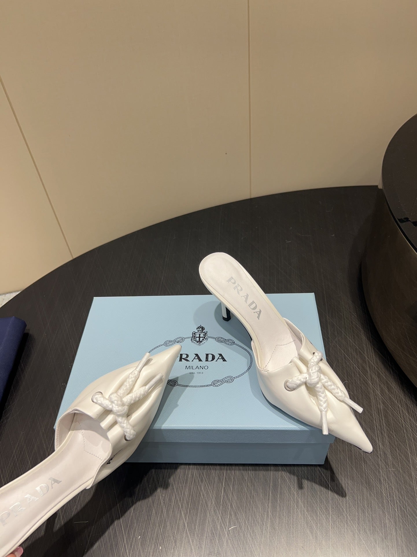 PRADA 25S BRAIDED DETAIL MULES 85MM IN WHITE CALFSKIN