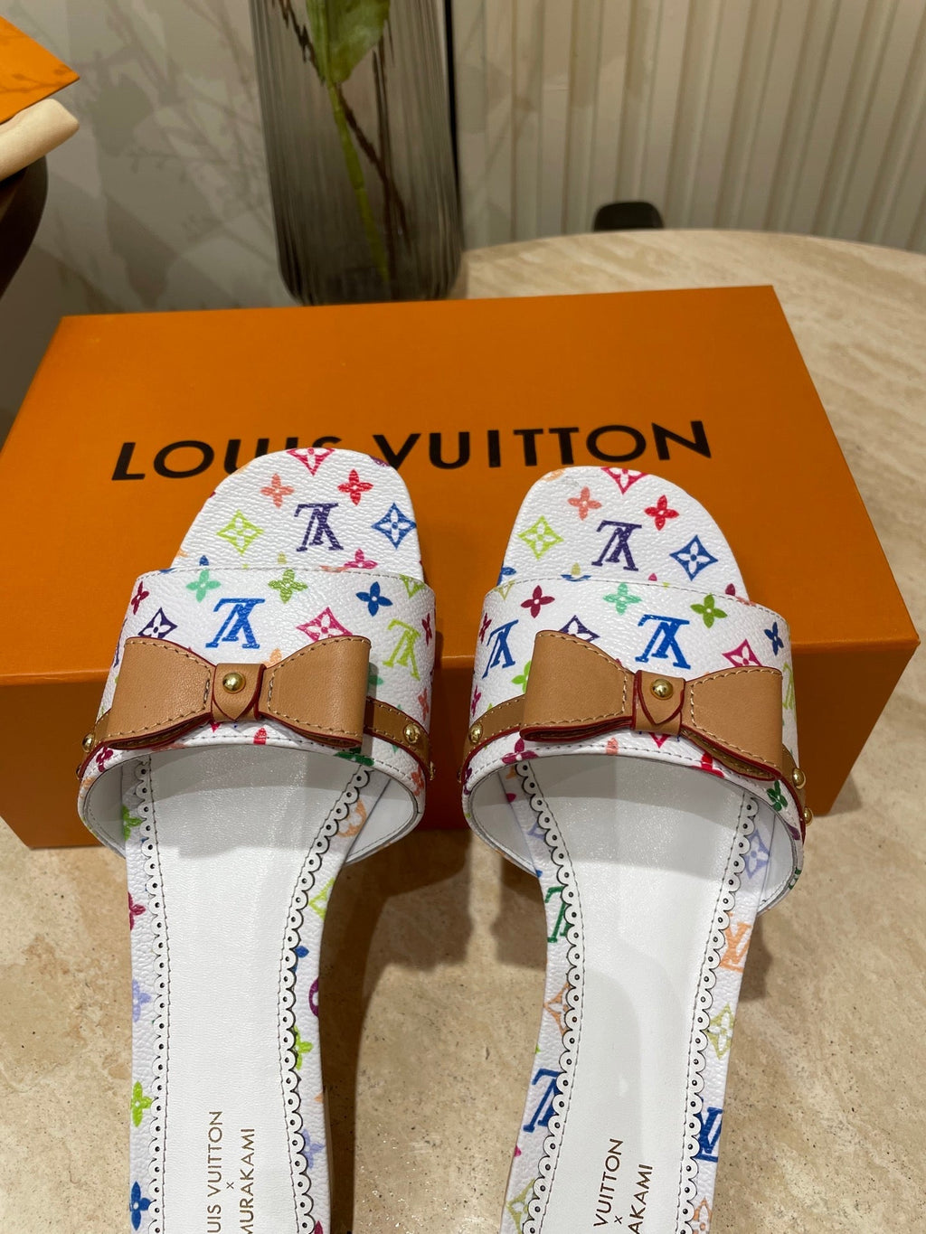 FLAT MULES IN WHITE MONOGRAM LAMBSKIN