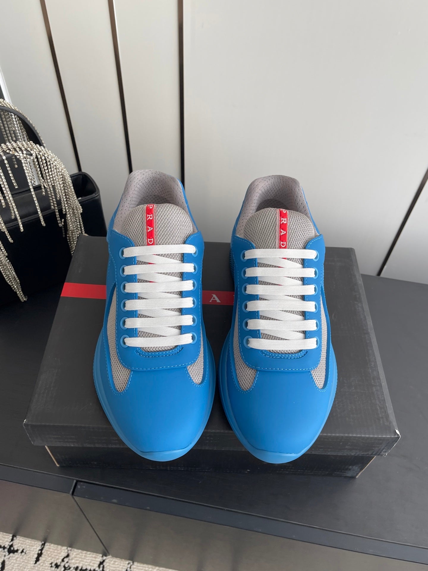 PRADA 26S AMERICA CUP SNEAKERS IN AZURE BLUE SOFT RUBBER AND BIKE FABRIC