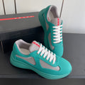 PRADA 26S AMERICA CUP SNEAKERS IN TEAL BLUE SOFT RUBBER AND BIKE FABRIC