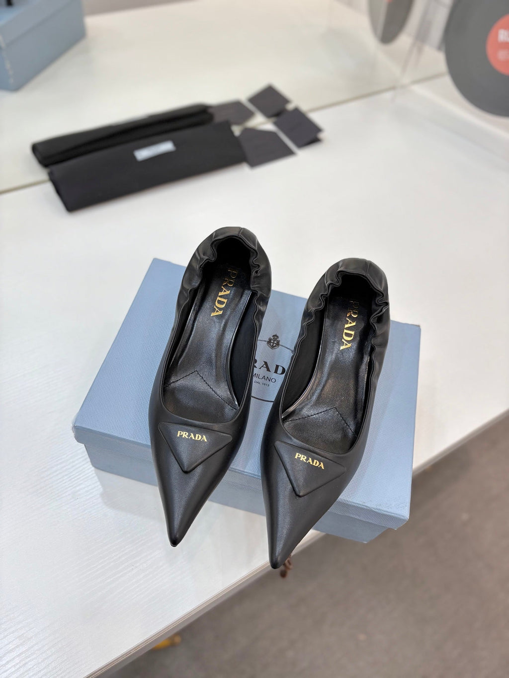 PRADA 26S PUMPS 55MM IN BLACK CALFSKIN WITH LOGO