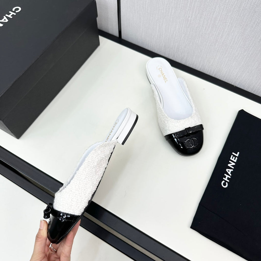 BOW MULE IN WHITE FUR AND BLACK CALFSKIN