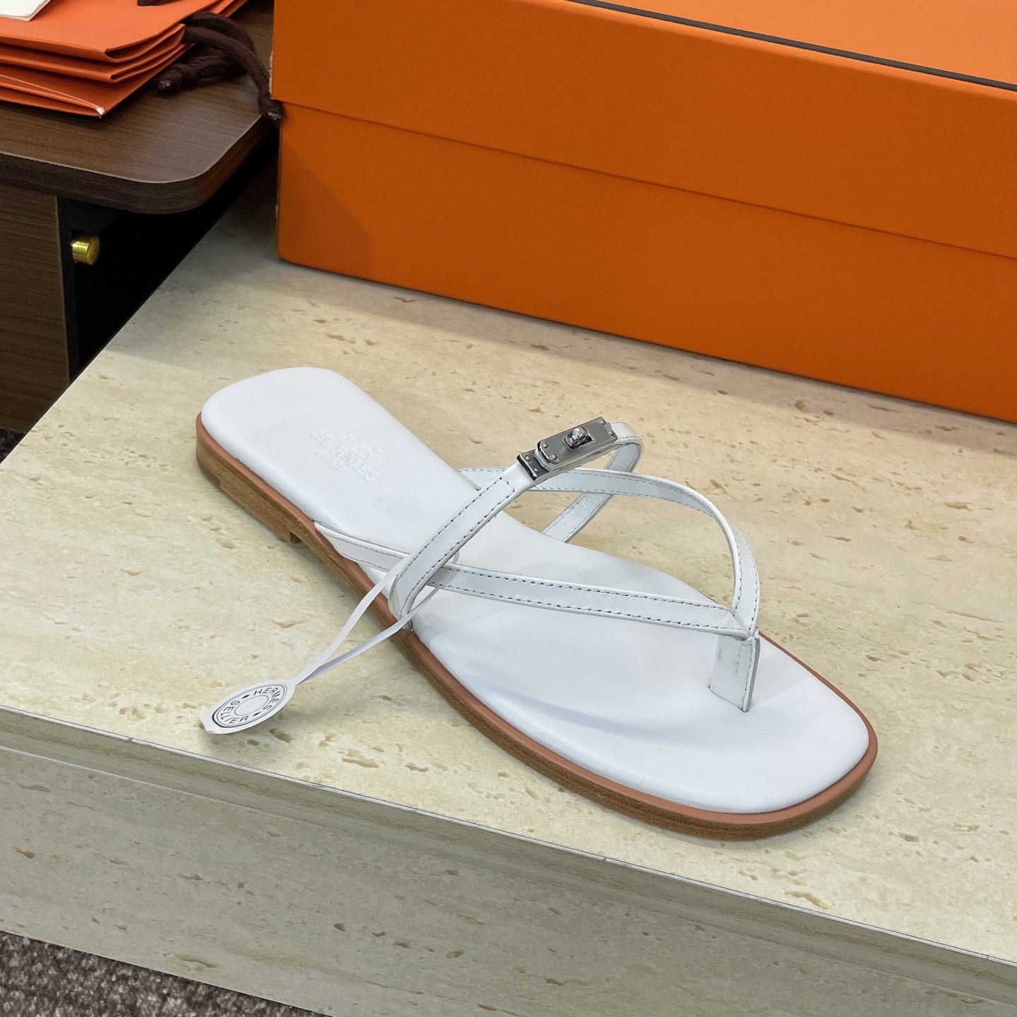 HM 26ss Kelly Sliver Buckle Slipper White Calfskin 607159