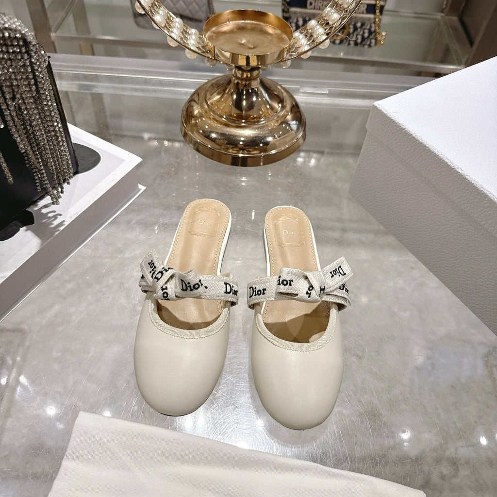 CD 26 Bow Flat Mules Embroidered Sheepskin