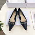 CD 25 Pump Flat Black Calfskin 307415